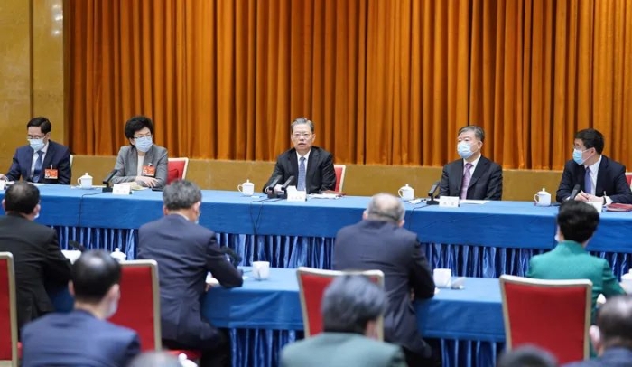 3月6日，中共中央政治局常委、中央紀委書記趙樂際看望出席全國政協十三屆四次會議的農工黨、體育界委員并參加討論。新華社記者 張領 攝